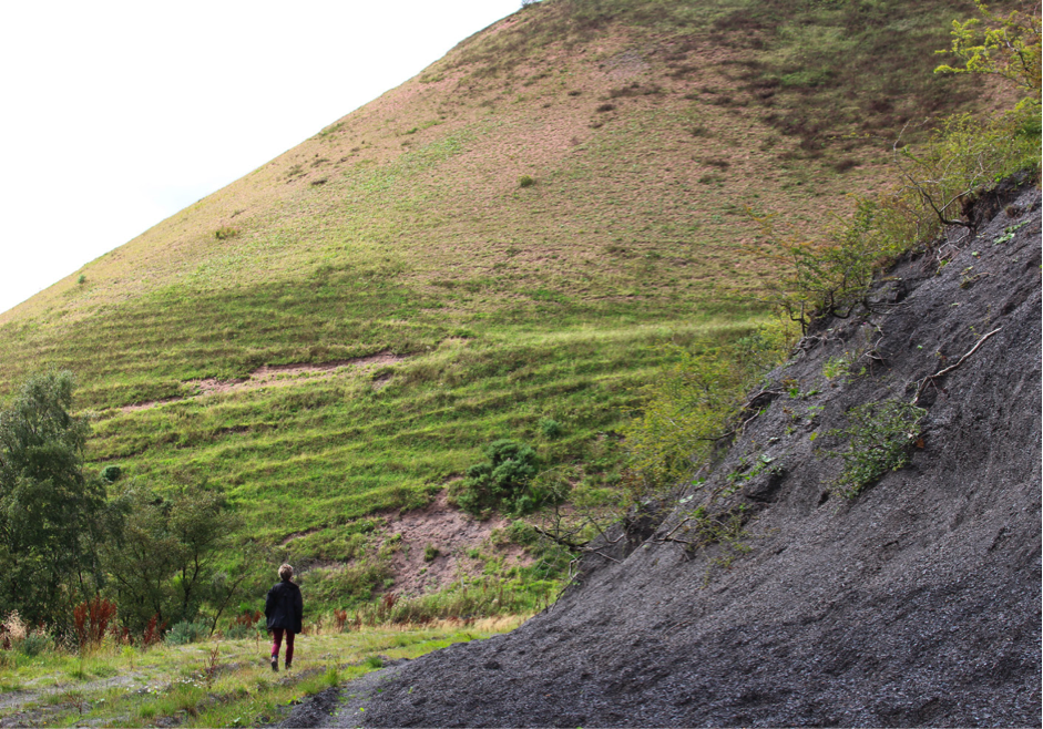 Onya McCausland walking around the base of Five Sisters bing. Photograph, Brendan McConville, 2016 (Aerial Landscapes workshop  1)