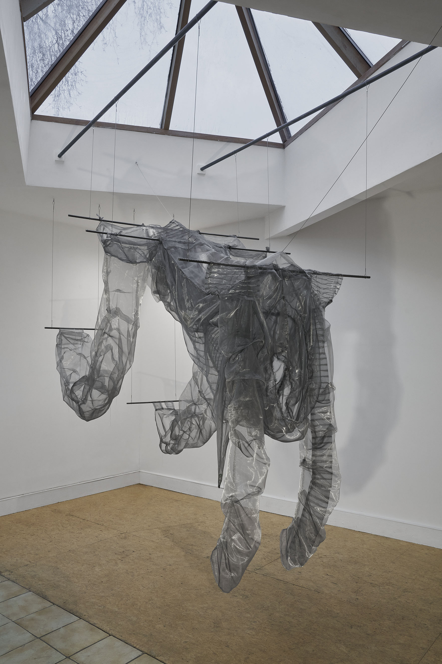 Housing T (Current Affairs), Organza, steel, aluminium, marbles, lice comb, tweezers, lighter, lipstick, whistles, key, ring pulls, hair pins, coins, pendant. 2024. (AGATA MADEJSKA: 9)