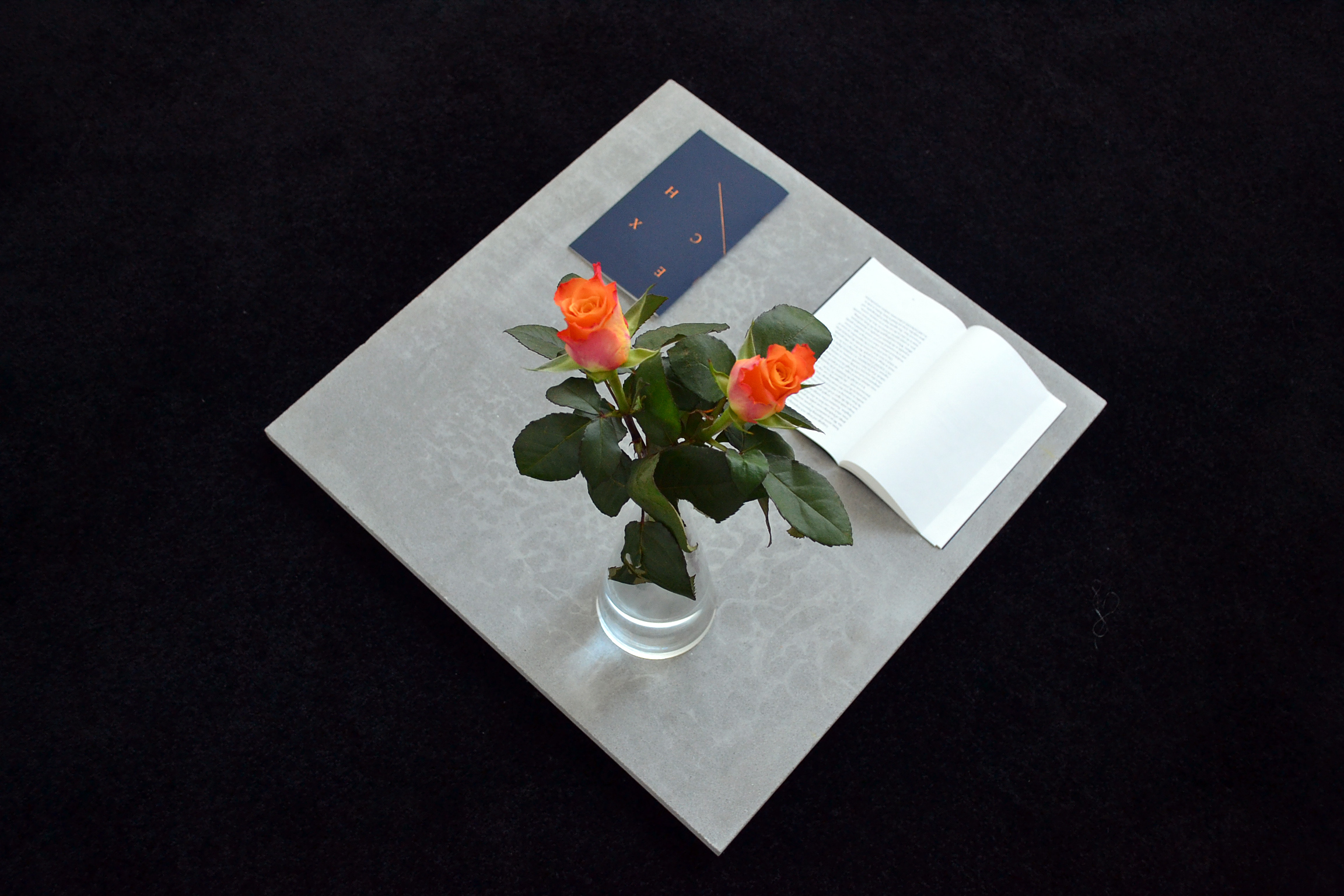 Exchange John Latham, Gil Leung, Patricia Lennox-Boyd, Hollis Frampton, Robert Morris, Ian White, H.D. 2013, Publication, designed by Modern Activity. Monumentality Structure II Gil Leung, 2013 Pietra Serena Limestone. Seasonal Flowers. (EXCHANGE  0)